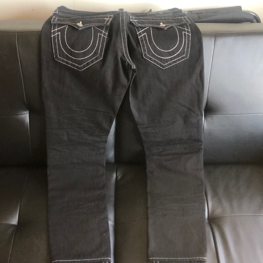 Black pair of True Religion Jeans